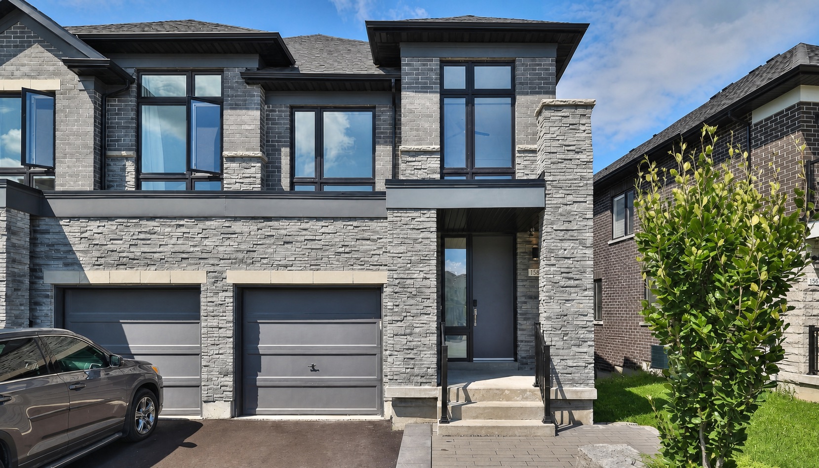 Modern stone and grey-brick home from the ASM inspection archive